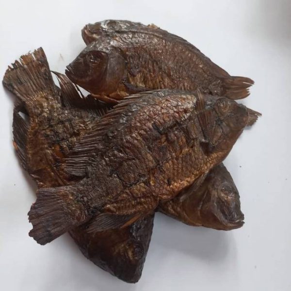 The whole smoked tilapia is a white flesh fish - Image 2